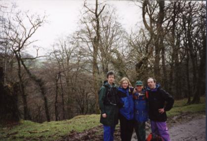 We gather for a group photo on a ridge overlooking a wooded valley